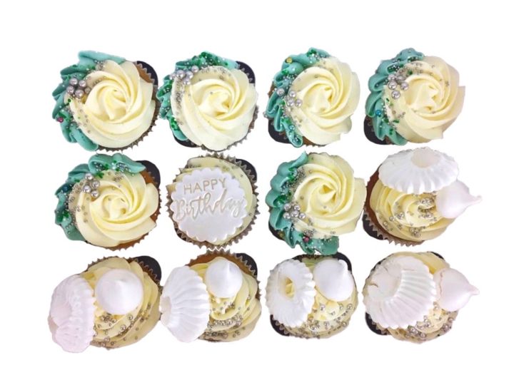 12 birthday cupcakes, light cream and blue
