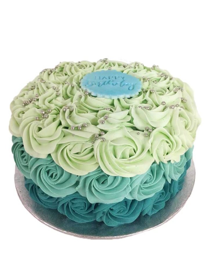 ombre cake with dark blue to light blue layers