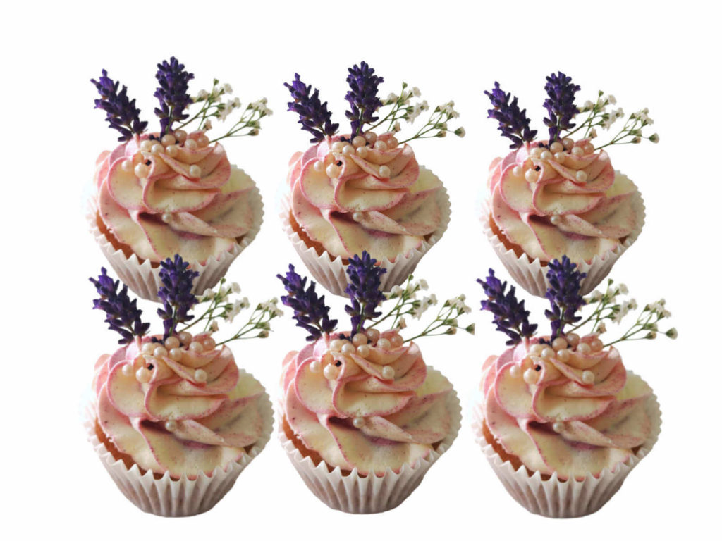 simple and elegant light pink cupcakes with lavender flower