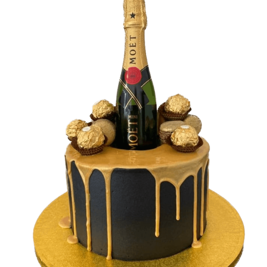 champagne drip cake gold and black theme