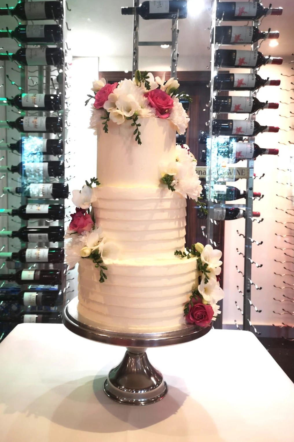 A Tall Wedding Cake for a Small Wedding but the rest of the cake can be frozen for later