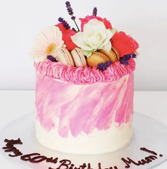 most popular birthday cakes in dublin vanilla cake white and pink strokes