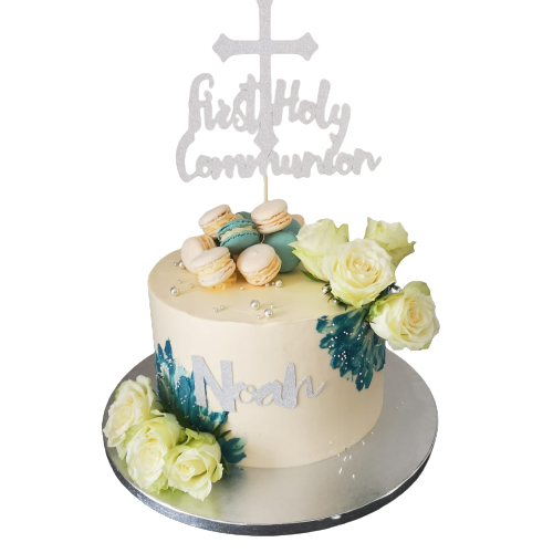 White and blue communion cake with silver topper