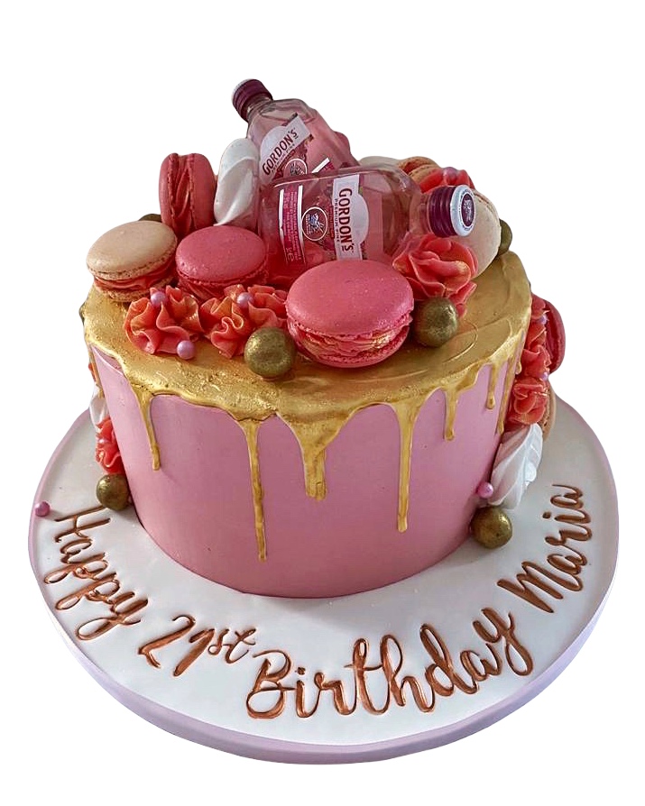 21st birthday cake with gin bottles and pink decorations