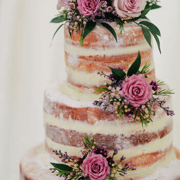 Naked wedding cake with colourful flowers (1)