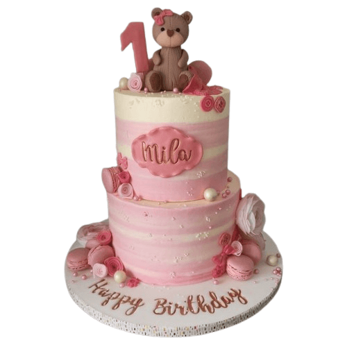 pink teddy cake with fondant buttons, macaroons and sprinkles
